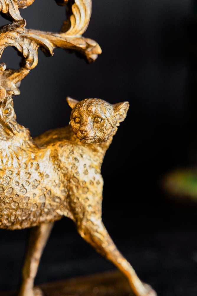 Bougeoir guépard en or antique
