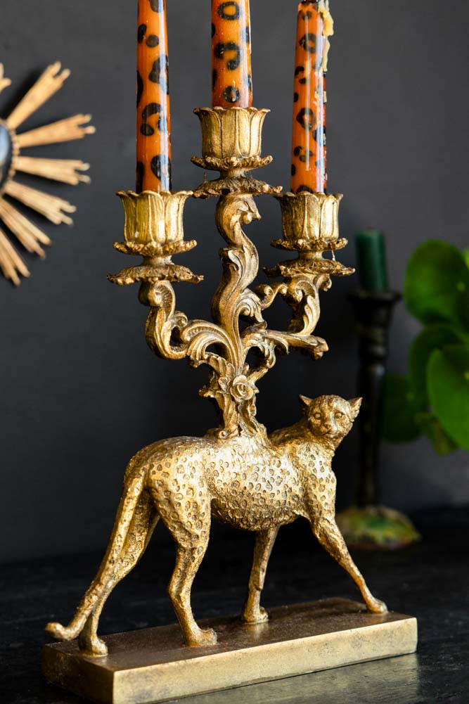 Bougeoir guépard en or antique