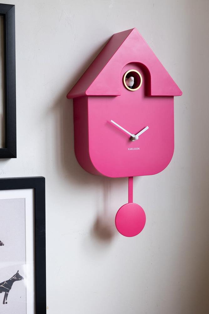 Horloge murale moderne à coucou rose vif