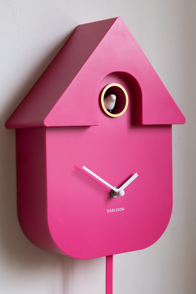 Horloge murale moderne à coucou rose vif