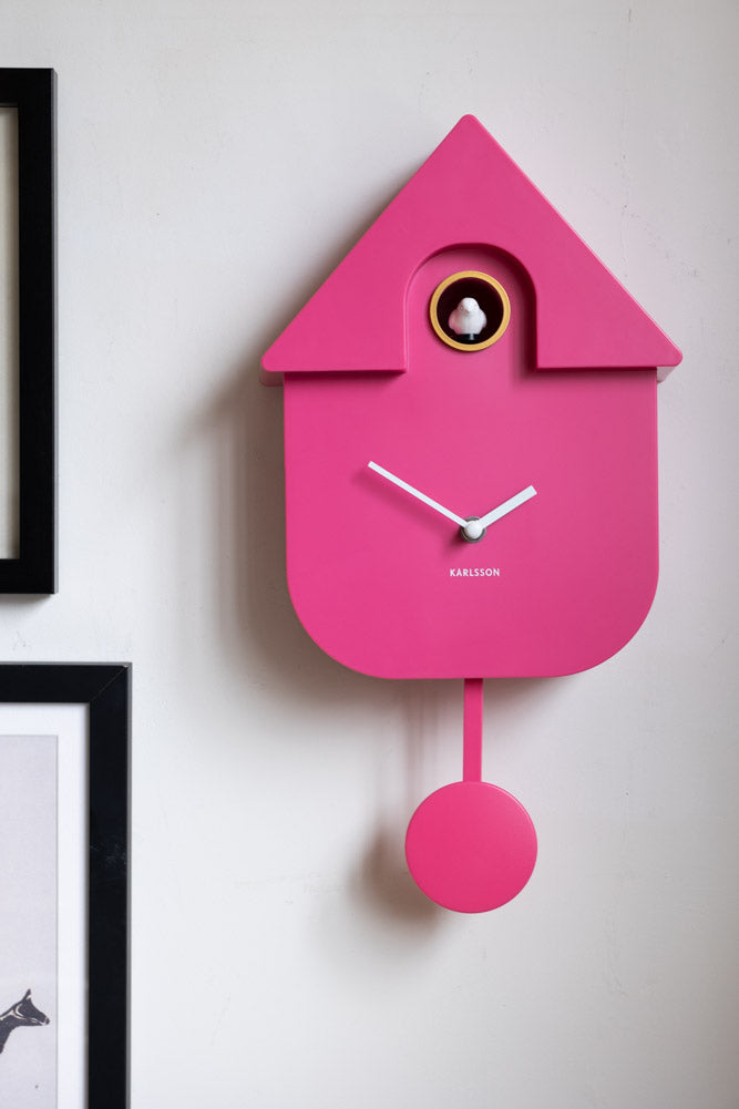 Horloge murale moderne à coucou rose vif